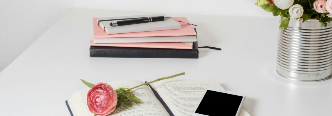 Book On A White Wooden Table