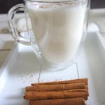 Cinnamon Sticks beside the Glass of Milk